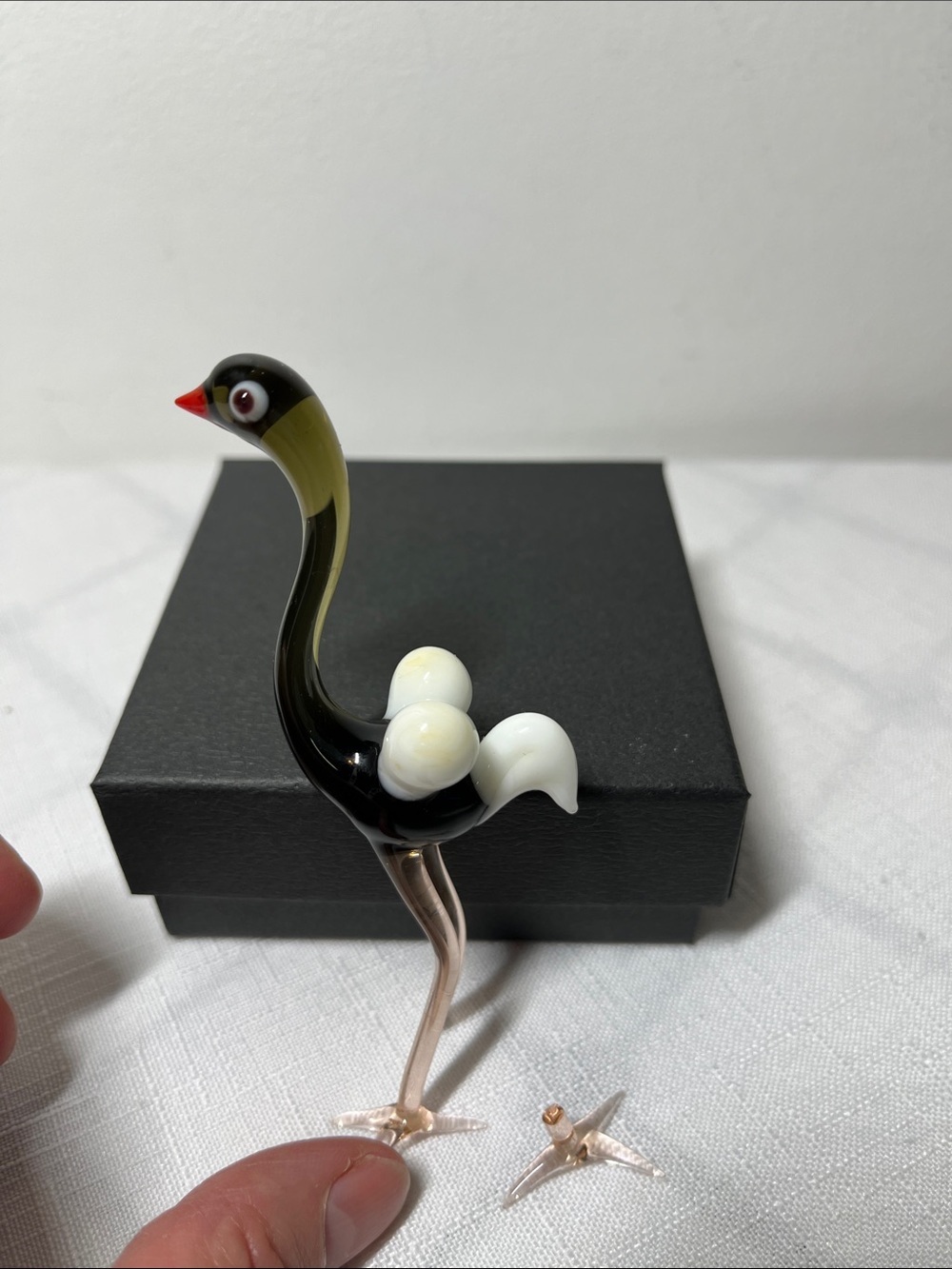 Hand-Blown Glass Flamingo Figurine 
Broken foot. Clean break. Fixable